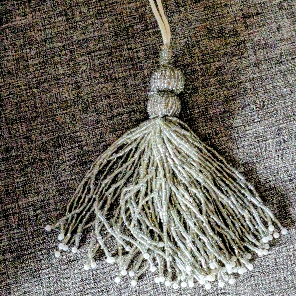 Elegant Beaded Silver Tassel Decor